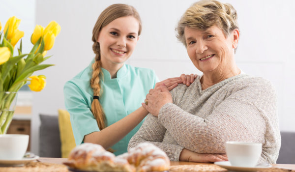 caregiver and elderly woman